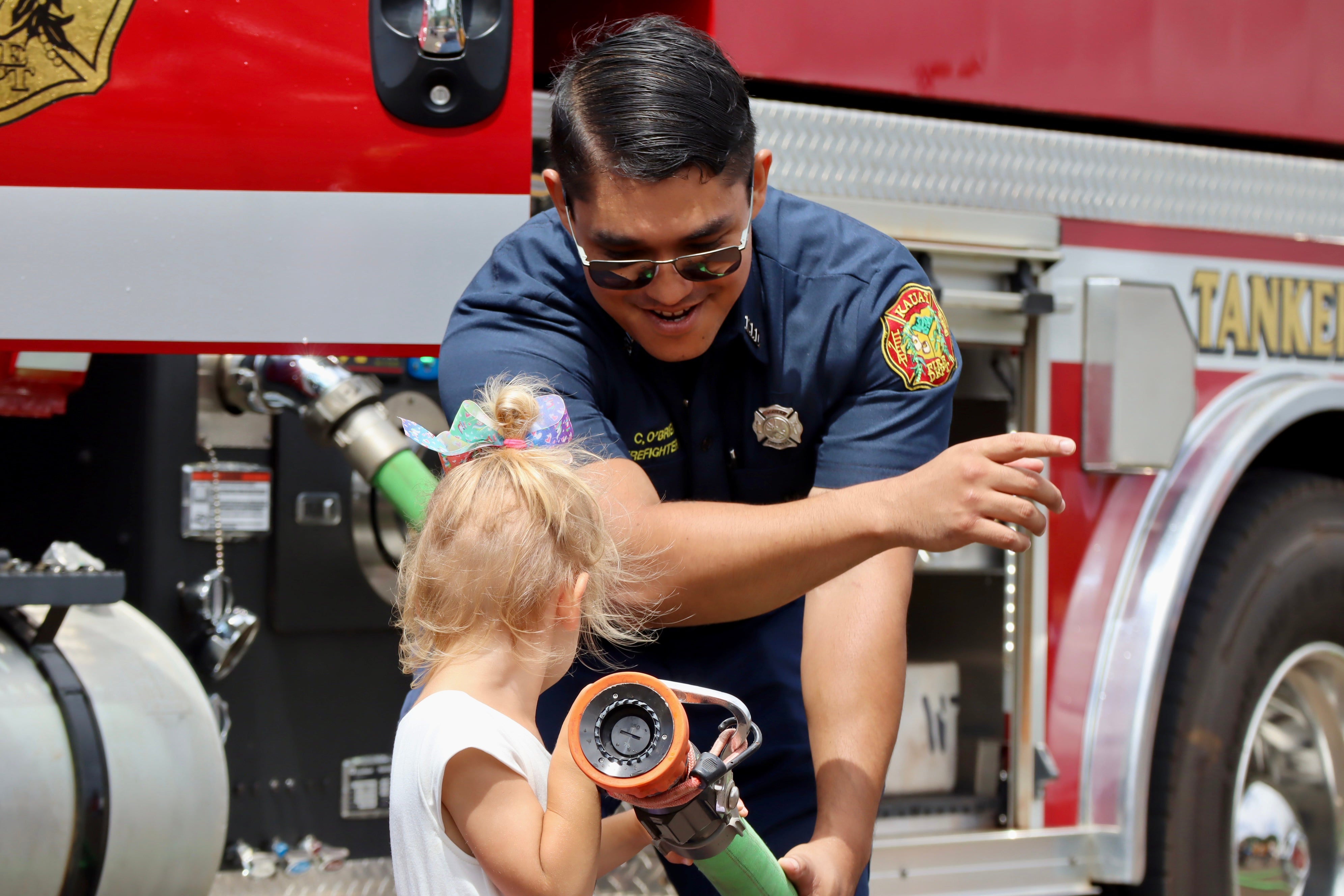 firefighter with toddler
