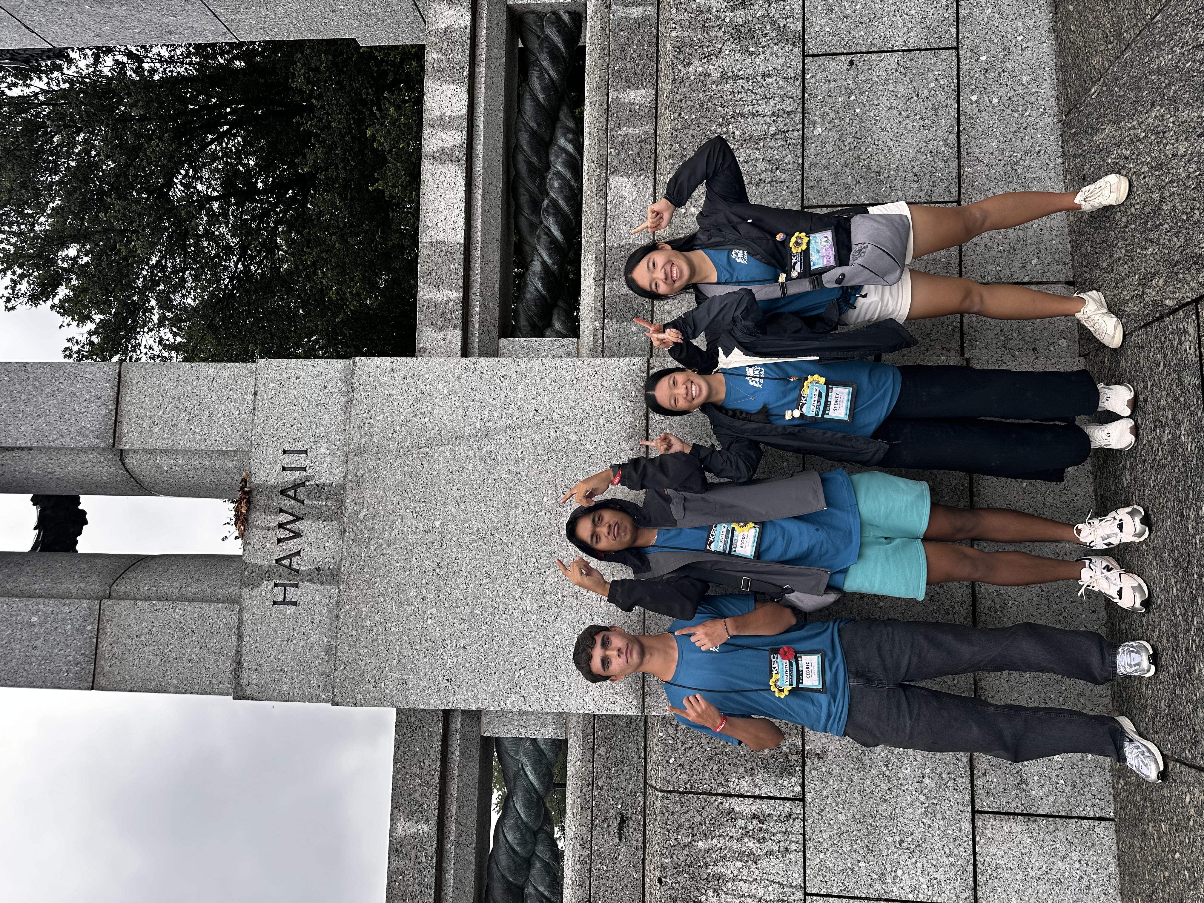 Standing in front of Hawaii monument