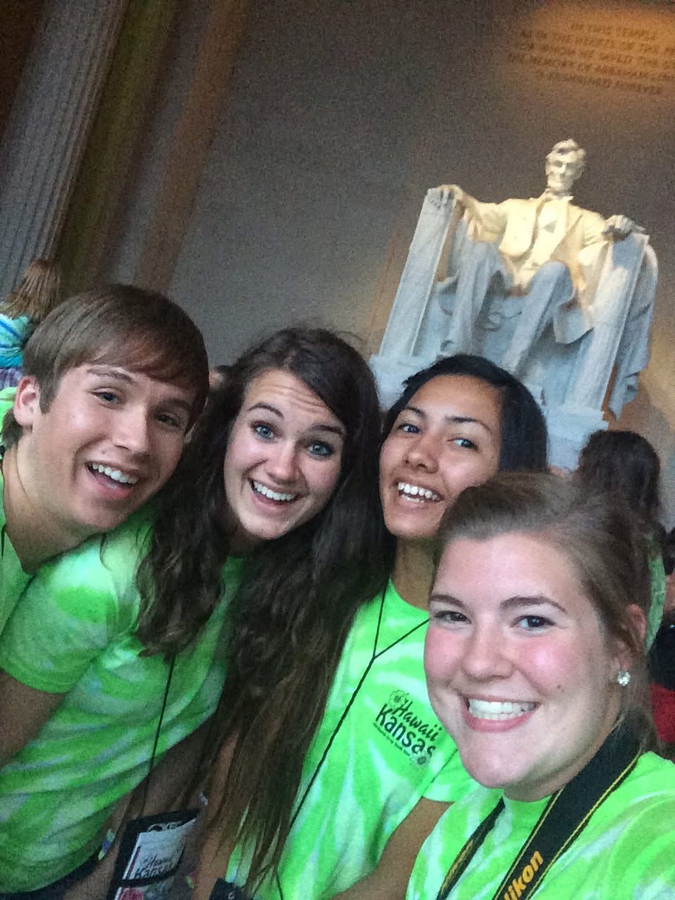 4 students smiling