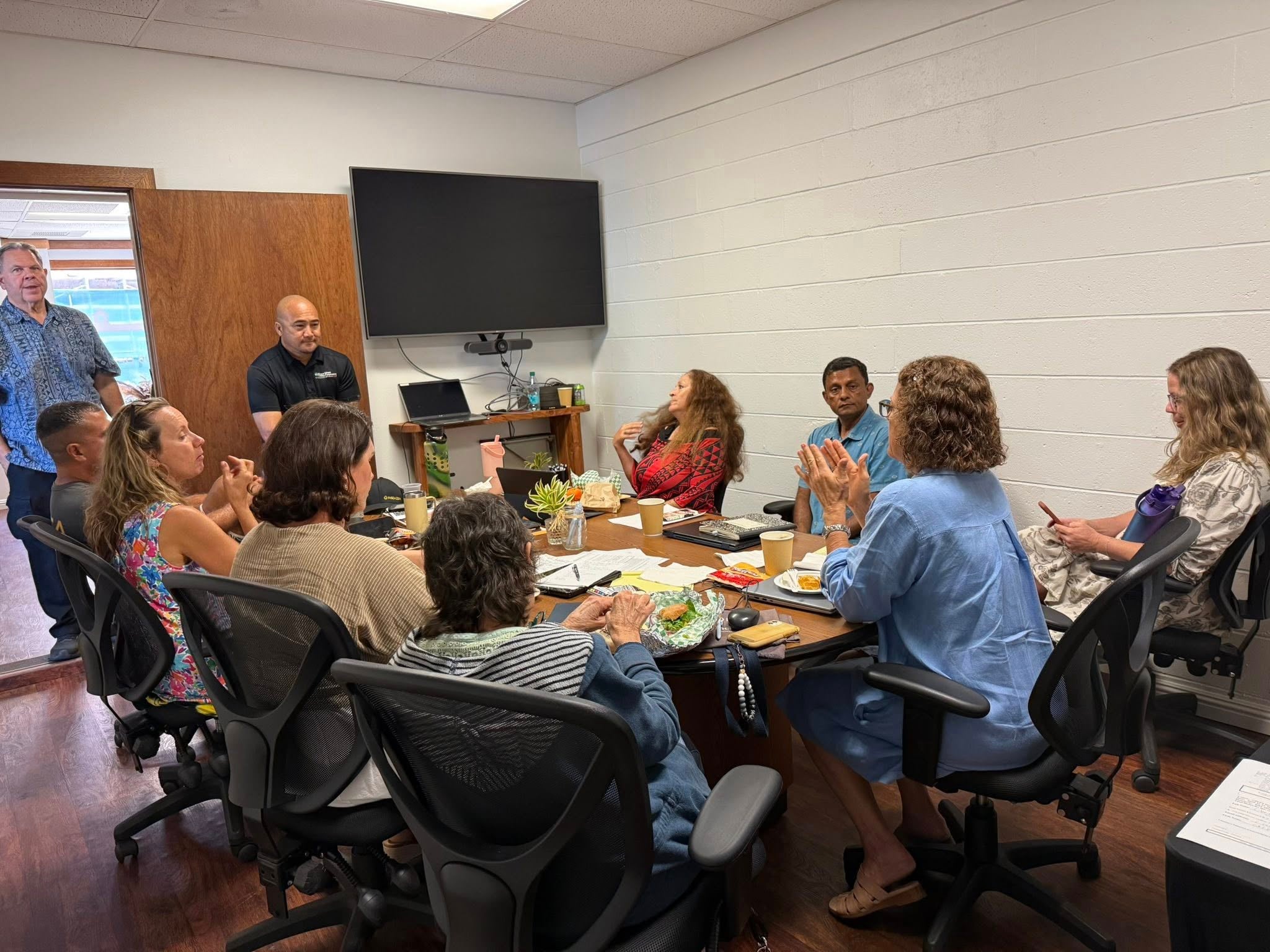 realtors at a meeting sitting around a table
