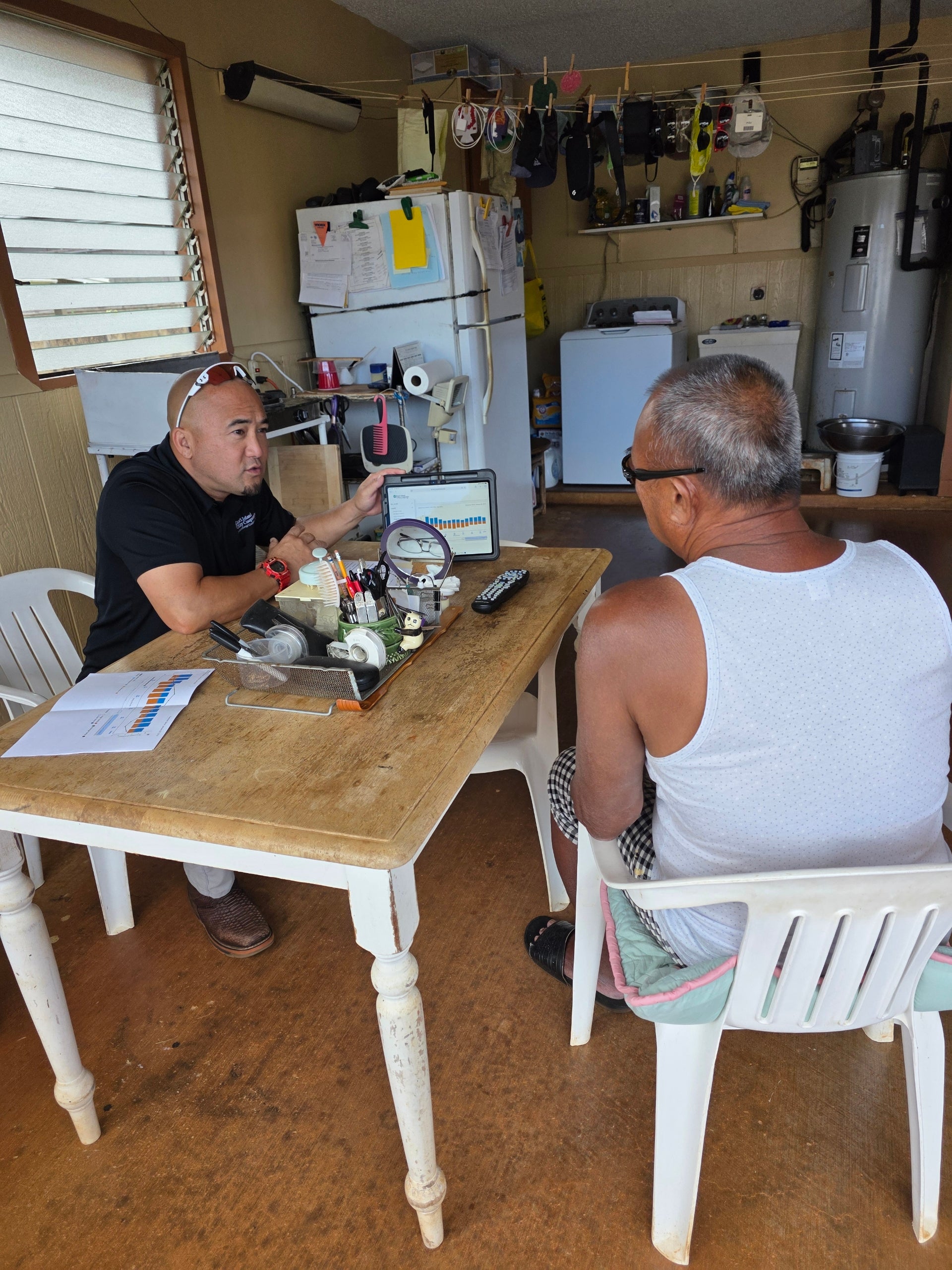 two men discussing over a table