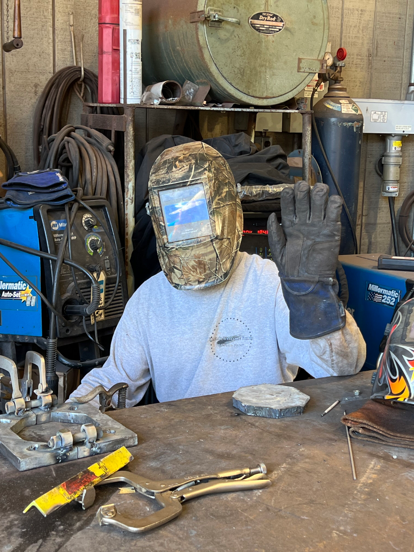 Weylon Ruiz, power plant maintenance person, wears safety gear while working