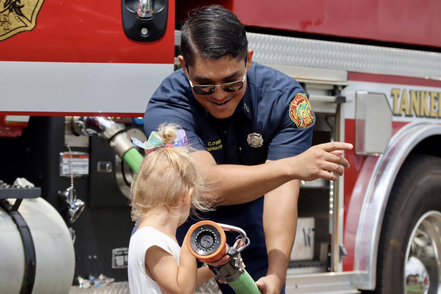 firefighter with toddler